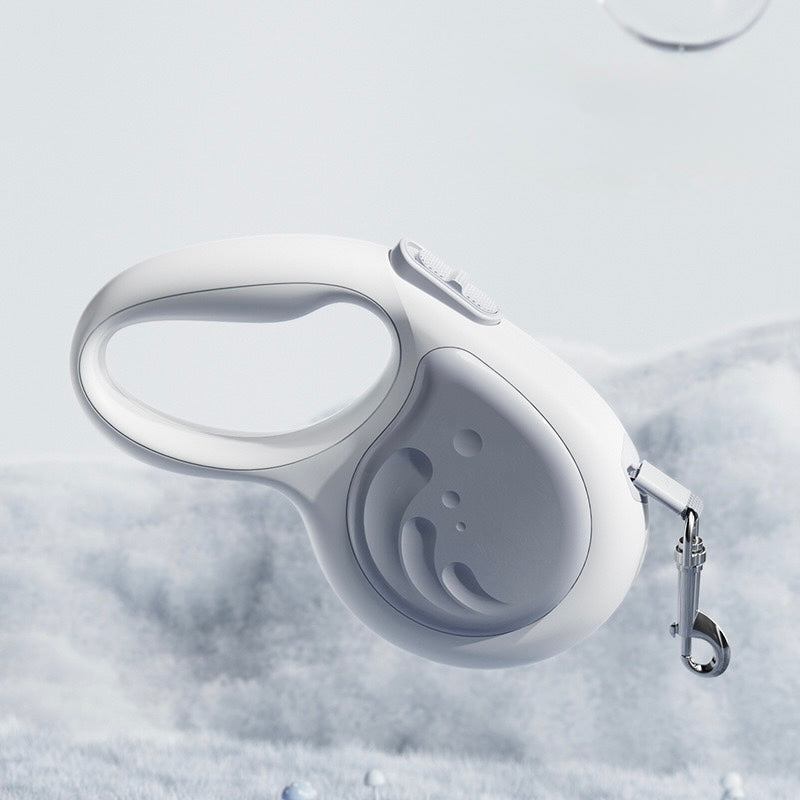 White retractable dog leash on a textured white background
