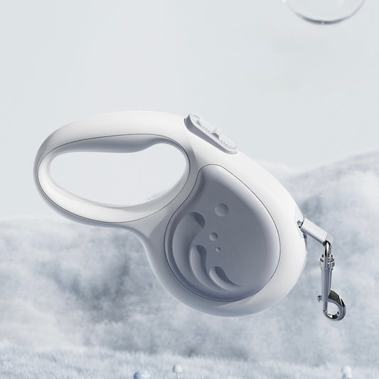 White retractable dog leash on a textured white background